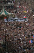 Millions gathered in Place de la Republique on Sunday, Jan. 11 to take a stand against terrorism. Multiple cards held up, display the glasses and eyes of murdered Charlie Hebdo editor, Stephane Charbonnier. Image of Millions gathered in Place de la Republique on Sunday, Jan. 11 to take a stand against terrorism. Multiple cards held up, display the glasses and eyes of murdered Charlie Hebdo editor, Stephane Charbonnier.