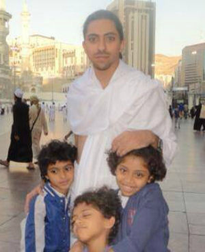 Raif Badawi stands with his children. His wife and kids fled to Canada after his arrest. Raif Badawi stands with his children. His wife and kids fled to Canada after his arrest.