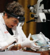 Pam Hatchfield, head of objects conservation for Boston's Museum of Fine Arts, is seen opening the time capsule with complete awe. Image of Pam Hatchfield, head of objects conservation for Boston's Museum of Fine Arts, is seen opening the time capsule with complete awe.