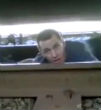 Unknown man is filmed escaping out from underneath a moving train. Image of Unknown man is filmed escaping out from underneath a moving train.