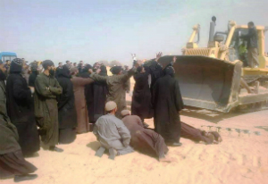 Coptic monks lie before bulldozers as workers chant 'Allahu Akbar!' Coptic monks lie before bulldozers as workers chant 'Allahu Akbar!'