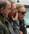 Families are hit with grief as the search for bodies continues. Image of Families are hit with grief as the search for bodies continues.