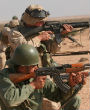 A U.S. Marine and a Moroccan army soldier train together, part of a growing number of programs where Western militaries conduct drills with African nations in order to help them combat Islamic jihadists. Image of A U.S. Marine and a Moroccan army soldier train together, part of a growing number of programs where Western militaries conduct drills with African nations in order to help them combat Islamic jihadists.