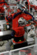 Robots already work in numerous industries, including vehicle manufacturing. Image of Robots already work in numerous industries, including vehicle manufacturing.