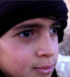 The young boy, no older than 10, appears in new ISIS video beheading a Syrian soldier. Image of The young boy, no older than 10, appears in new ISIS video beheading a Syrian soldier.