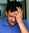 Abdullah Kurdi, 40, cries as he prepares for the funeral of his wife, 27-year old Rehan, and sons, 5-year old Galip and 3-year-old Aylan. Image of Abdullah Kurdi, 40, cries as he prepares for the funeral of his wife, 27-year old Rehan, and sons, 5-year old Galip and 3-year-old Aylan.