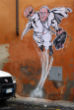 Pope Francis painted into a Superhero near the Vatican. Image of Pope Francis painted into a Superhero near the Vatican.
