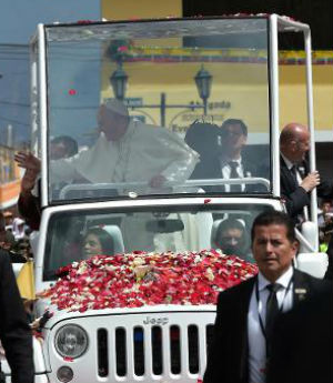 Pope Francis must always ride in a bulletproof popemobile, a practice put into place following the assassination attempt on John Paul II in 1981. Image of Pope Francis must always ride in a bulletproof popemobile, a practice put into place following the assassination attempt on John Paul II in 1981.