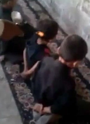 Brainwashed Iraqi children play shocking game by 'shooting' each other