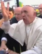 Pope Francis was overpowered by the crowd, forcing him to stumble over man in wheelchair (YouTube). Image of Pope Francis was overpowered by the crowd, forcing him to stumble over man in wheelchair (YouTube).