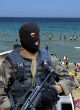 ISIS threatens popular beach resorts (Express). Image of ISIS threatens popular beach resorts (Express).