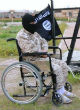 ISIS' wheelchair executioner at work again. Image of ISIS' wheelchair executioner at work again.