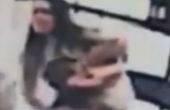 Mother holds children close after attempted kidnapping (CCTV screenshot). Image of Mother holds children close after attempted kidnapping (CCTV screenshot).