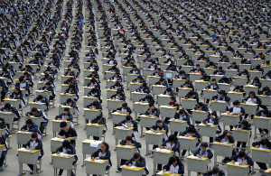 Students in China sit for an exam. Students in China sit for an exam.