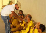 Christians, Muslims and non-believers join together to offer food and water to ISIS militants (Preemptive Love). Image of Christians, Muslims and non-believers join together to offer food and water to ISIS militants (Preemptive Love).