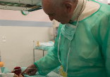 Pope Francis with infant. Image of Pope Francis with infant.