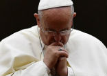 Pope Francis prays for the victims of ISIS cruelty. Image of Pope Francis prays for the victims of ISIS cruelty.
