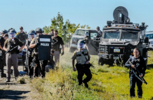 Heavily armed police prepare to move in against protestors in North Dakota. Heavily armed police prepare to move in against protestors in North Dakota.