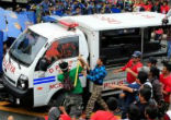 Anti-US protestors were struck with a police van, which then backed up over the crowd to hit them again. Image of Anti-US protestors were struck with a police van, which then backed up over the crowd to hit them again.