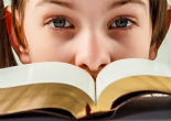 Kids are encouraged to bring their Bibles to school on October 6 (Shutterstock). Image of Kids are encouraged to bring their Bibles to school on October 6 (Shutterstock).