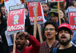 Anti-Trump protests cross from one side of the spectrum to the other. Image of Anti-Trump protests cross from one side of the spectrum to the other.