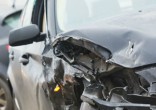 A car accident (not pictured) launched an infant onto the street. Image of A car accident (not pictured) launched an infant onto the street.