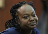 Woman arrested for second-degree murder. Image of Woman arrested for second-degree murder.