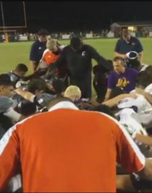 Youth pastor under fire for praying for injured player. Youth pastor under fire for praying for injured player.