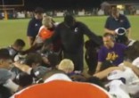 Youth pastor under fire for praying for injured player. Image of Youth pastor under fire for praying for injured player.