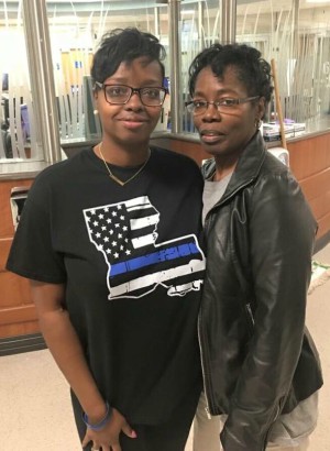 Hero Vickie Williams-Tillman (Right) saved Officer Billy Amie (Baton Rouge Police Department/Facebook). Hero Vickie Williams-Tillman (Right) saved Officer Billy Amie (Baton Rouge Police Department/Facebook).