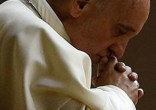 Pope Francis prays for Iraq as the innocents' death toll rises. Image of Pope Francis prays for Iraq as the innocents' death toll rises.