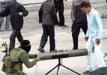For a group claiming to not be afraid of death, ISIS doesn't hesitate to use child shields. Image of For a group claiming to not be afraid of death, ISIS doesn't hesitate to use child shields.