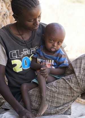 Emmanuel Ayapar are two of Kenya's 20 million citizens facing 'devastating levels' of food scarcity (Philip Ide). Emmanuel Ayapar are two of Kenya's 20 million citizens facing 'devastating levels' of food scarcity (Philip Ide).