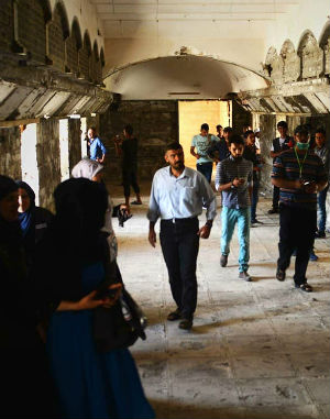 Young Muslims join Christians to rebuild a destroyed monastery in Iraq. Young Muslims join Christians to rebuild a destroyed monastery in Iraq.