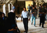 Young Muslims join Christians to rebuild a destroyed monastery in Iraq. Image of Young Muslims join Christians to rebuild a destroyed monastery in Iraq.