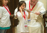Image of Pope Francis met with children affected by the Italy earthquakes. [Photo by: AFP]
