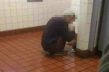 An addict huddles on the floor of a public restroom. Opioids cause the user to stop caring about things most people care about. An addict huddles on the floor of a public restroom. Opioids cause the user to stop caring about things most people care about.