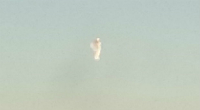 Youlanda Pope Britten captured this photo of an angel ascending into heaven. Youlanda Pope Britten captured this photo of an angel ascending into heaven.