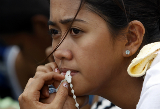 The people of the Philippines are using the rosary to fight back against violence. The people of the Philippines are using the rosary to fight back against violence.