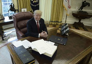 President Trump signed the tax cut bill early as a Christmas present for the American people. President Trump signed the tax cut bill early as a Christmas present for the American people.