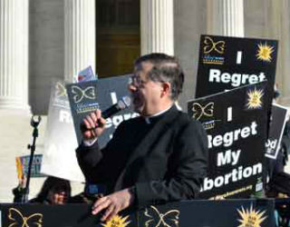 Father Frank Pavone, national director of Priests for Life, speaks during the Silent No More gathering in front of the Supreme Court at the 2018 March for Life in Washington, D.C. Father Frank Pavone, national director of Priests for Life, speaks during the Silent No More gathering in front of the Supreme Court at the 2018 March for Life in Washington, D.C.
