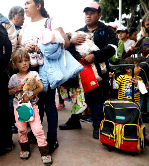 Many from the caravan fleeing violence were traveling with young children. Many from the caravan fleeing violence were traveling with young children.