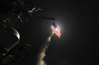 A cruise missile is fired from a U.S. Navy ship during a previous strike on Syrian facilities. Another such strike appears imminent. A cruise missile is fired from a U.S. Navy ship during a previous strike on Syrian facilities. Another such strike appears imminent.