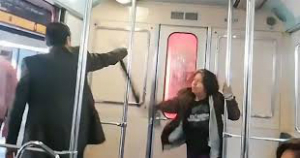 An allegedly possessed woman strikes at a man attempting an exorcism on her. An allegedly possessed woman strikes at a man attempting an exorcism on her.