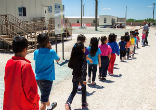 Young undocumented immigrants are being held in tent camps. Image of Young undocumented immigrants are being held in tent camps.