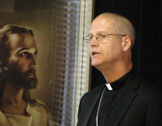Archbishop Paul D. Etienne of Anchorage Archbishop Paul D. Etienne of Anchorage