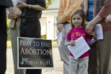 People praying at abortion clinic Image of People praying at abortion clinic
