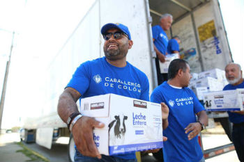 Members of the Knights of Columbus help to deliver supplies to the Casa de Migrantes in Ciudad Juarez Mexico Members of the Knights of Columbus help to deliver supplies to the Casa de Migrantes in Ciudad Juarez Mexico
