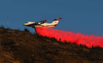 Air tanker drops fire retardant Air tanker drops fire retardant