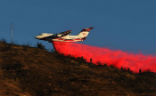 Air tanker drops fire retardant Image of Air tanker drops fire retardant